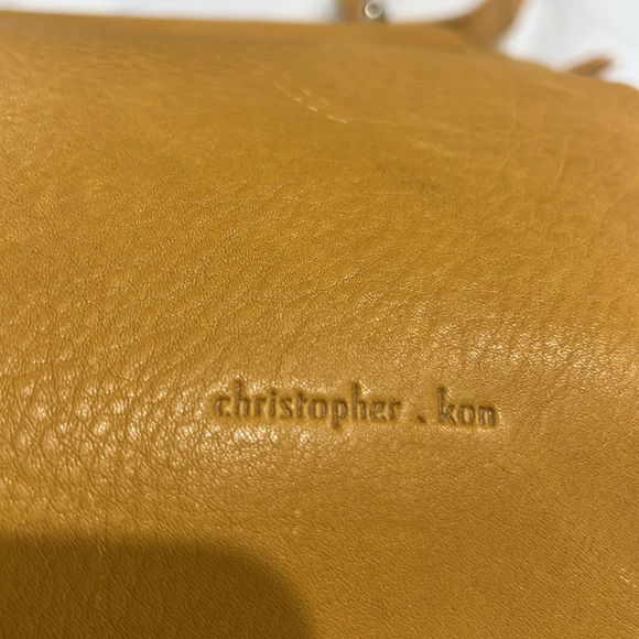 Handbag by Christopher Kon, Butterscotch leather. 15.5” w, 14.25” l, 1” d, - Picture 5 of 11